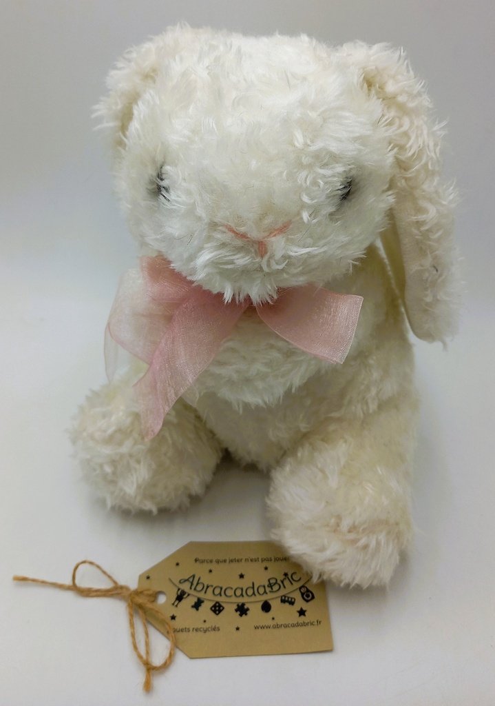 Lapin blanc avec noeud rose 23cm