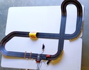 Circuit de course Cars télécommandé - CARRERA